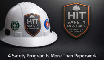 White safety hard hat with HIT Safety Solutions logo beside company shield logo and article title, A Safety Program Is More Than Paperwork
